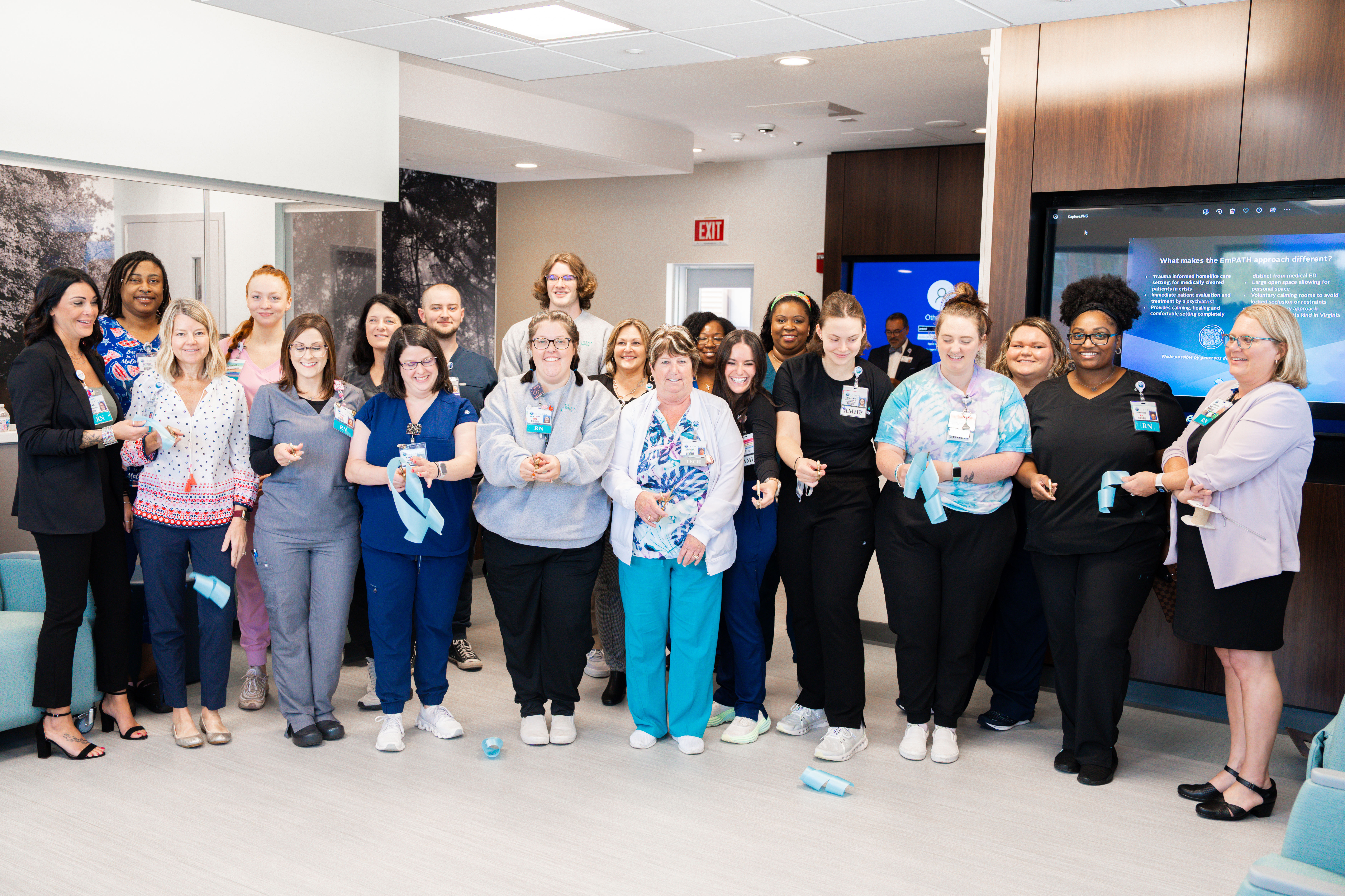 Caregivers cut the ribbon