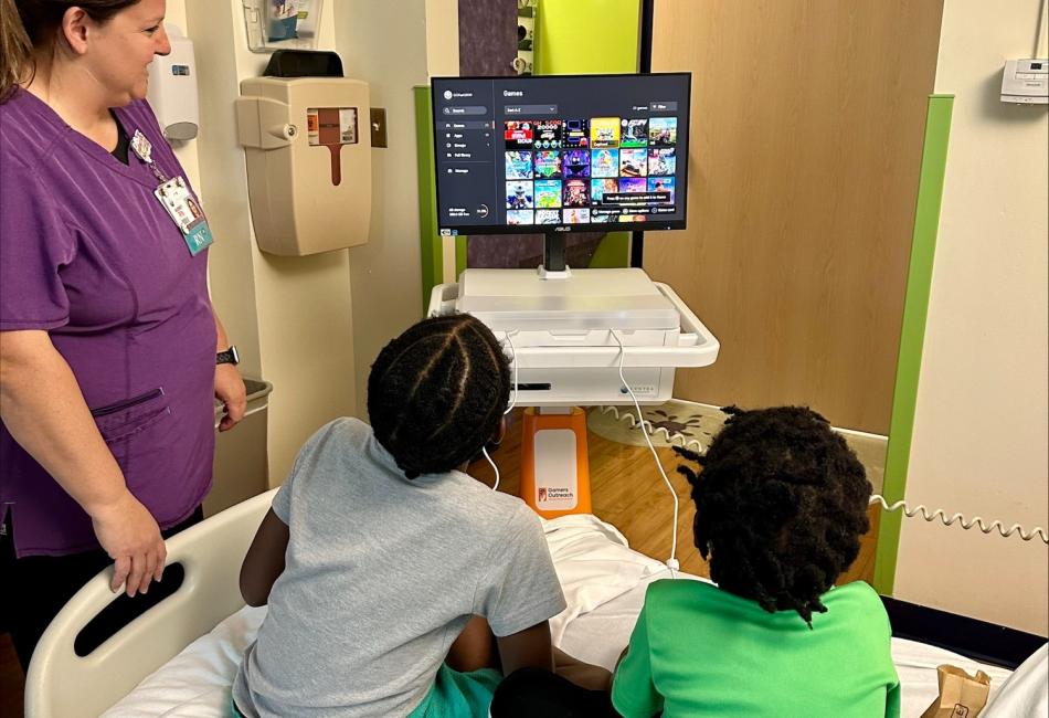 Children using a kiosk